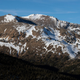 A lack of early season snow leaves mountain peaks in Clear Creek County, Colorado exposed.